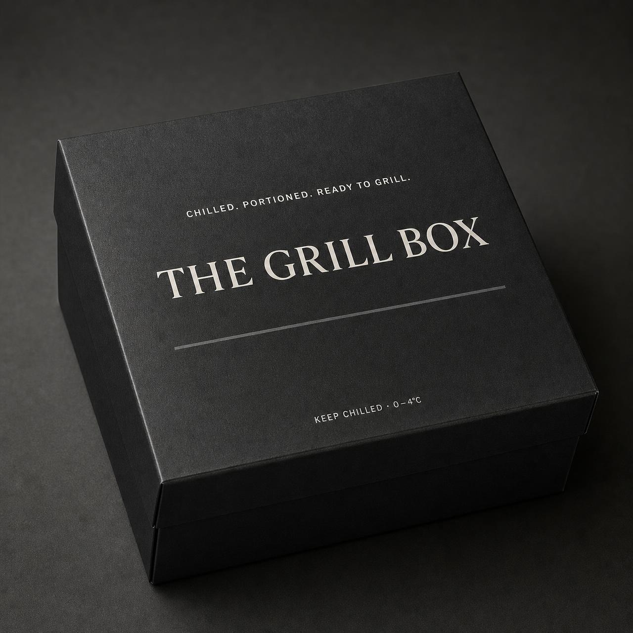 The Grill Box matte black insulated box with cream branding